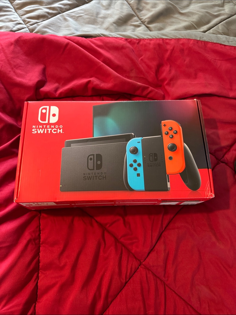 Nintendo Switch with Neon Red and Neon Blue Joy-Con